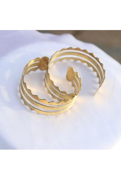 Brass liner embossed cuff bangle.